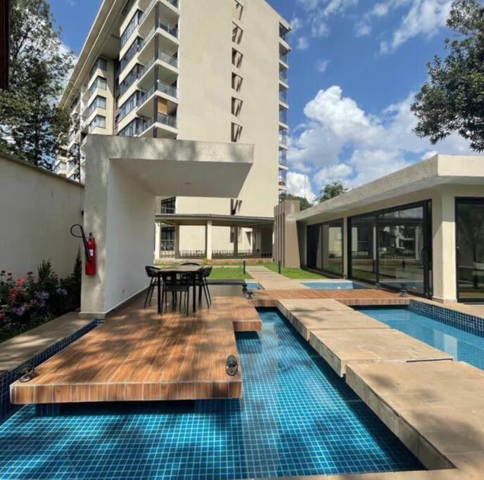 Airy Apartment W/ Pool + Gym Nairobi Bagian luar foto